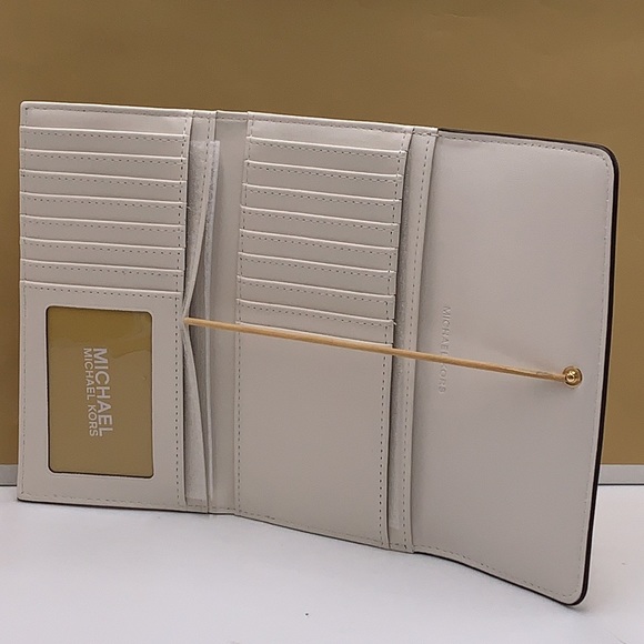 MICHAEL KORS JET SET TRAVEL 
LARGE TRIFOLD NON-LEATHER VEGAN 
WALLET
OPTI… - Picture 12 of 15